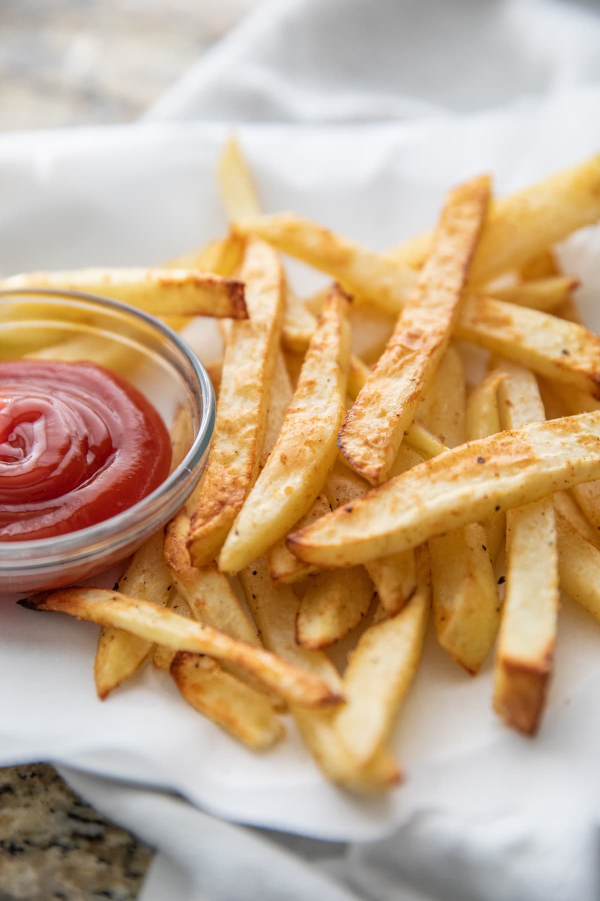 air fryer french fries on plate with ketchup