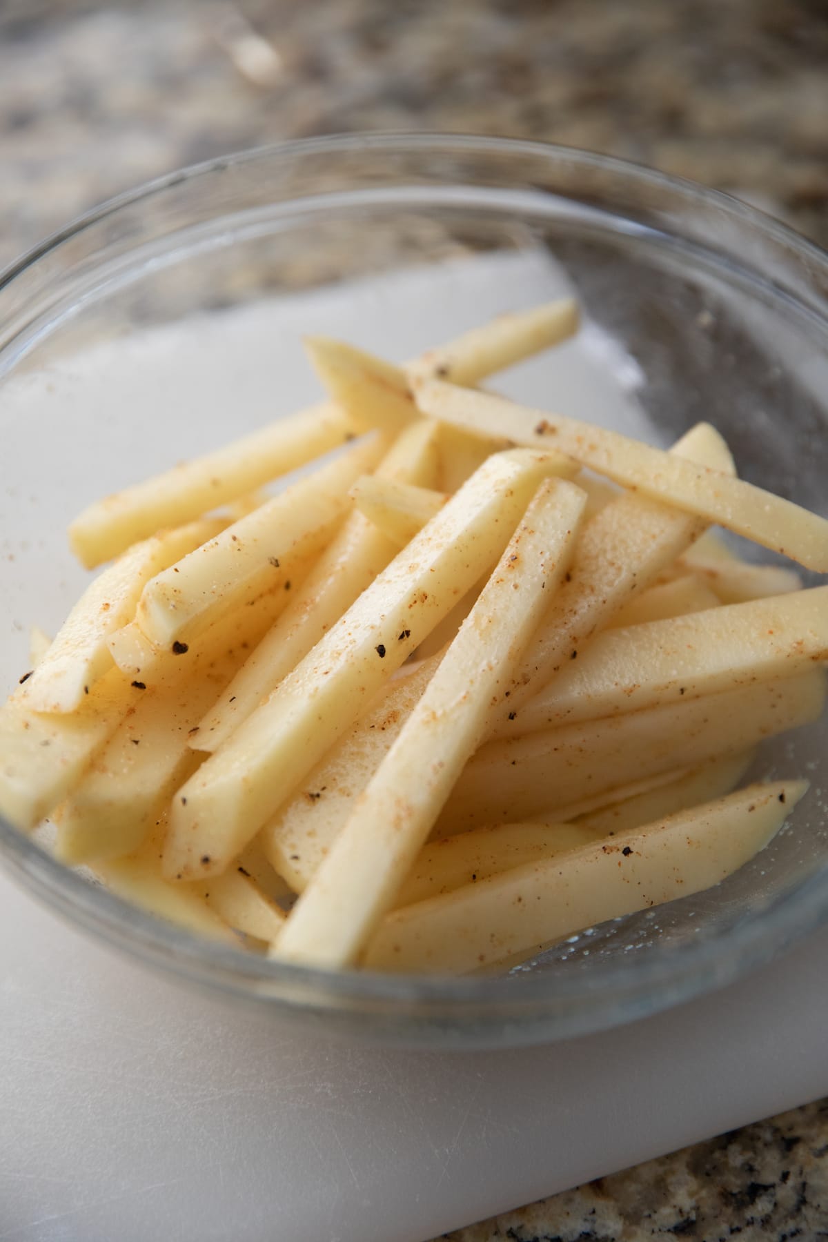 unbaked fries in bowl