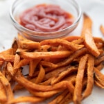 air fryer sweet potato fries on plate with ketchup