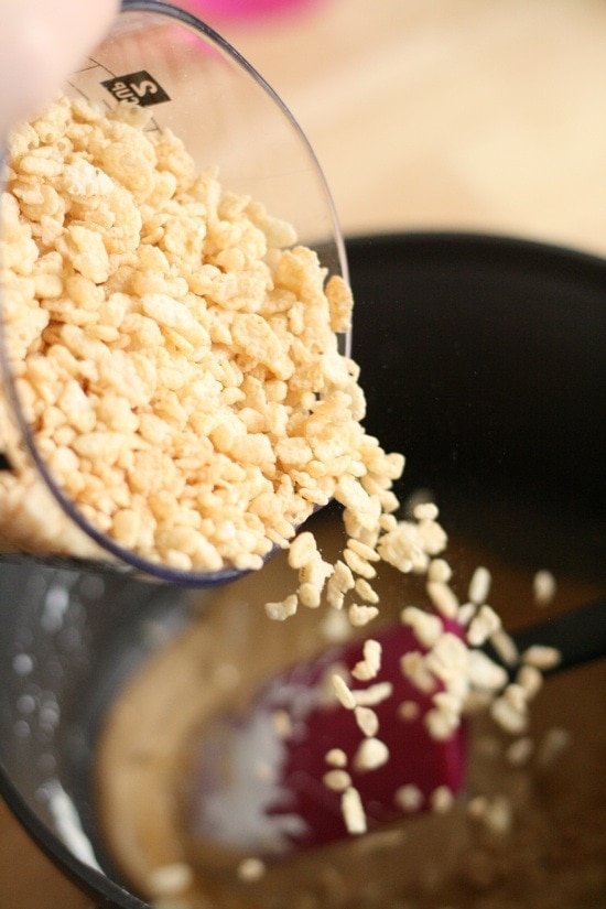 Adding Rice Krispie Cereal