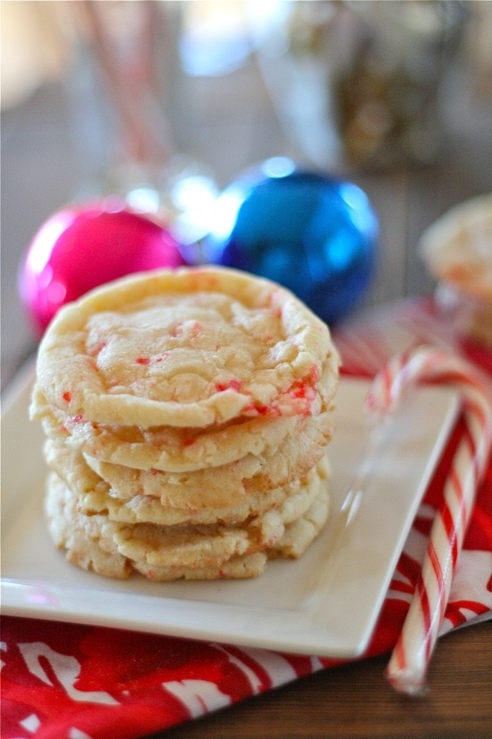 Candy Cane Cookies stacked on top of each other on a white plate