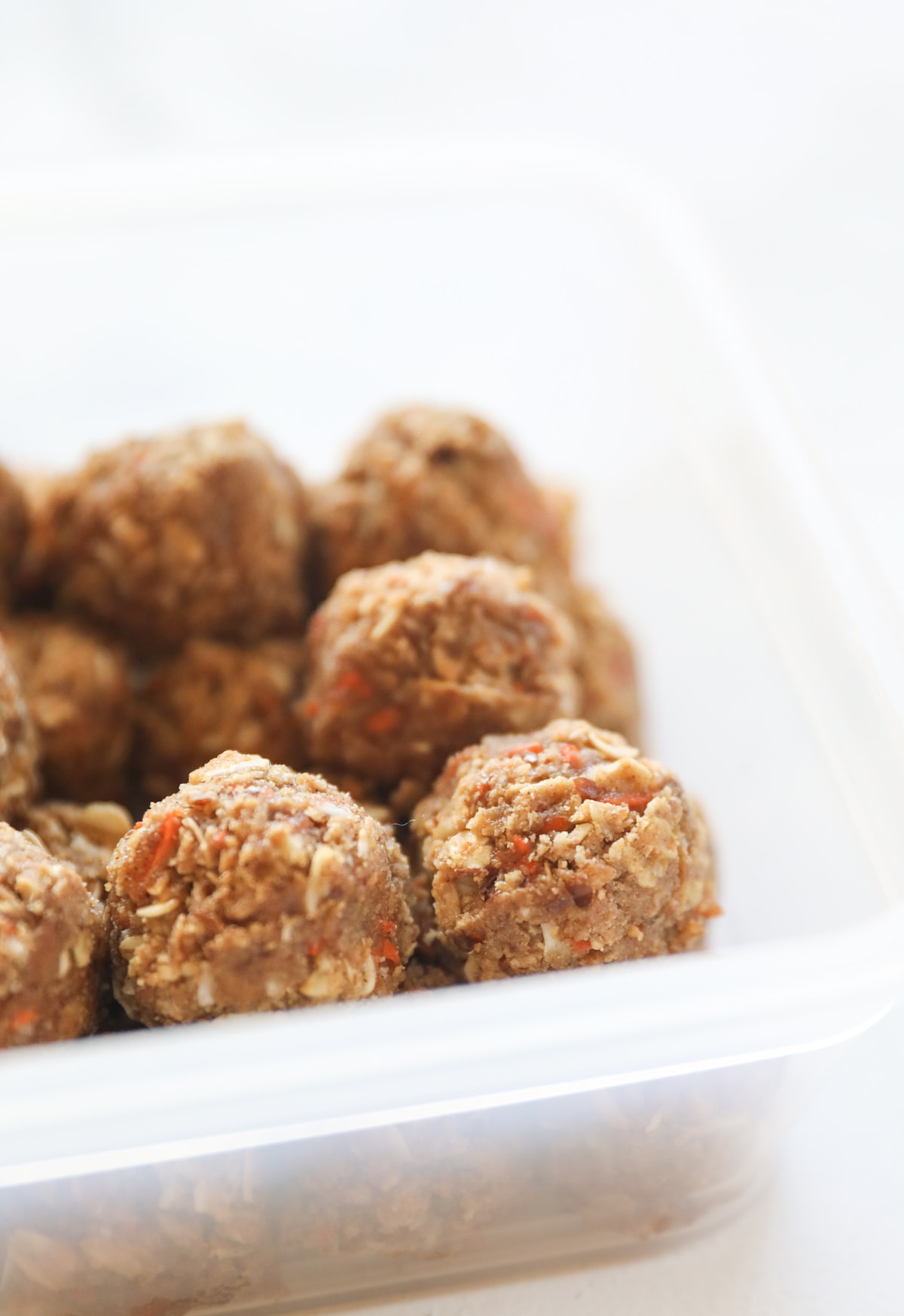 protein bites in tupperware container