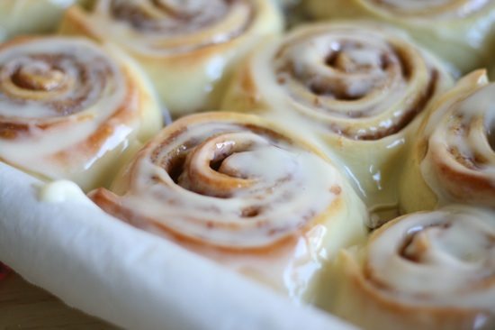 homemade Cinnamon Rolls in baking pan with frosting