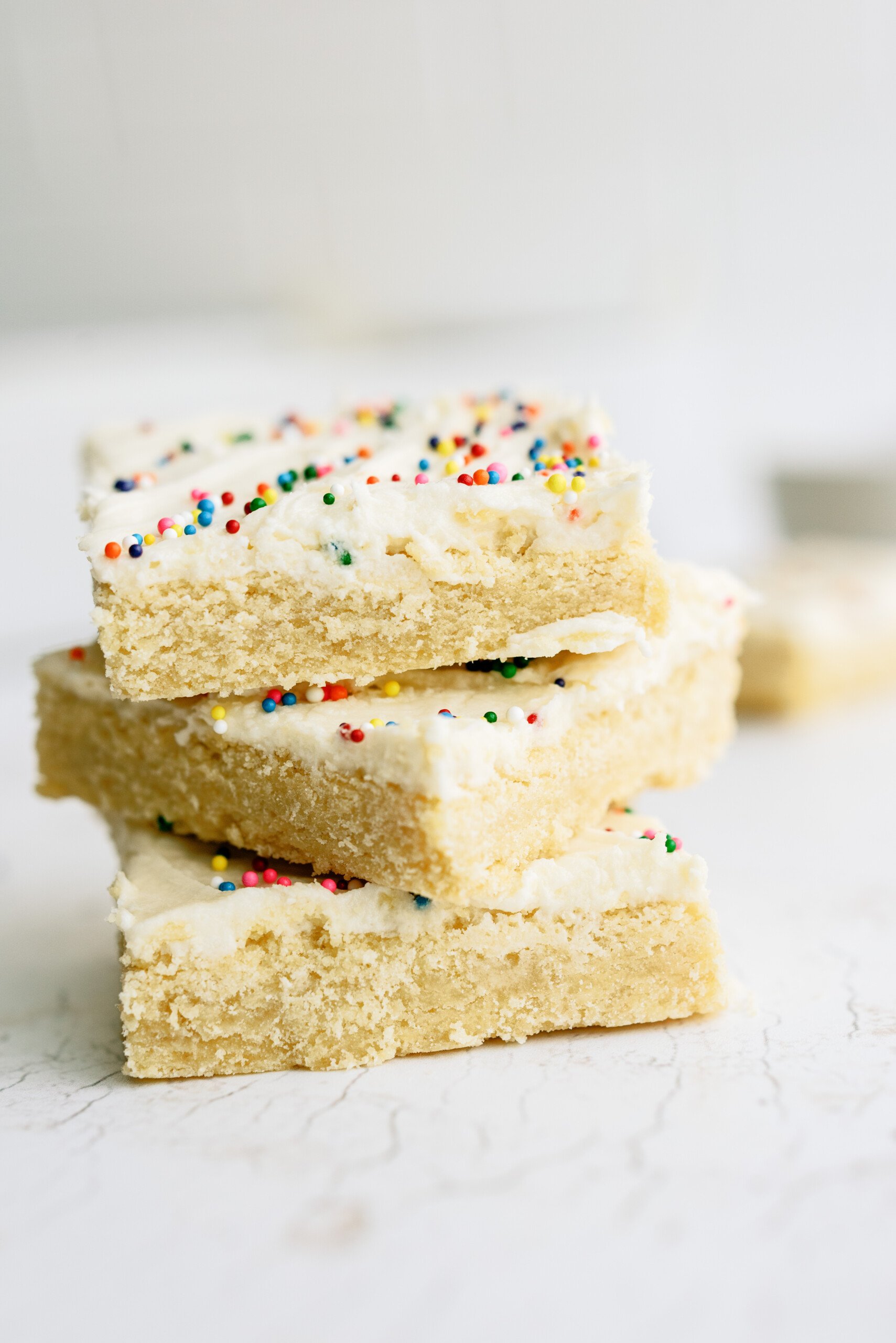 three sugar cookie bars stacked on top of each other