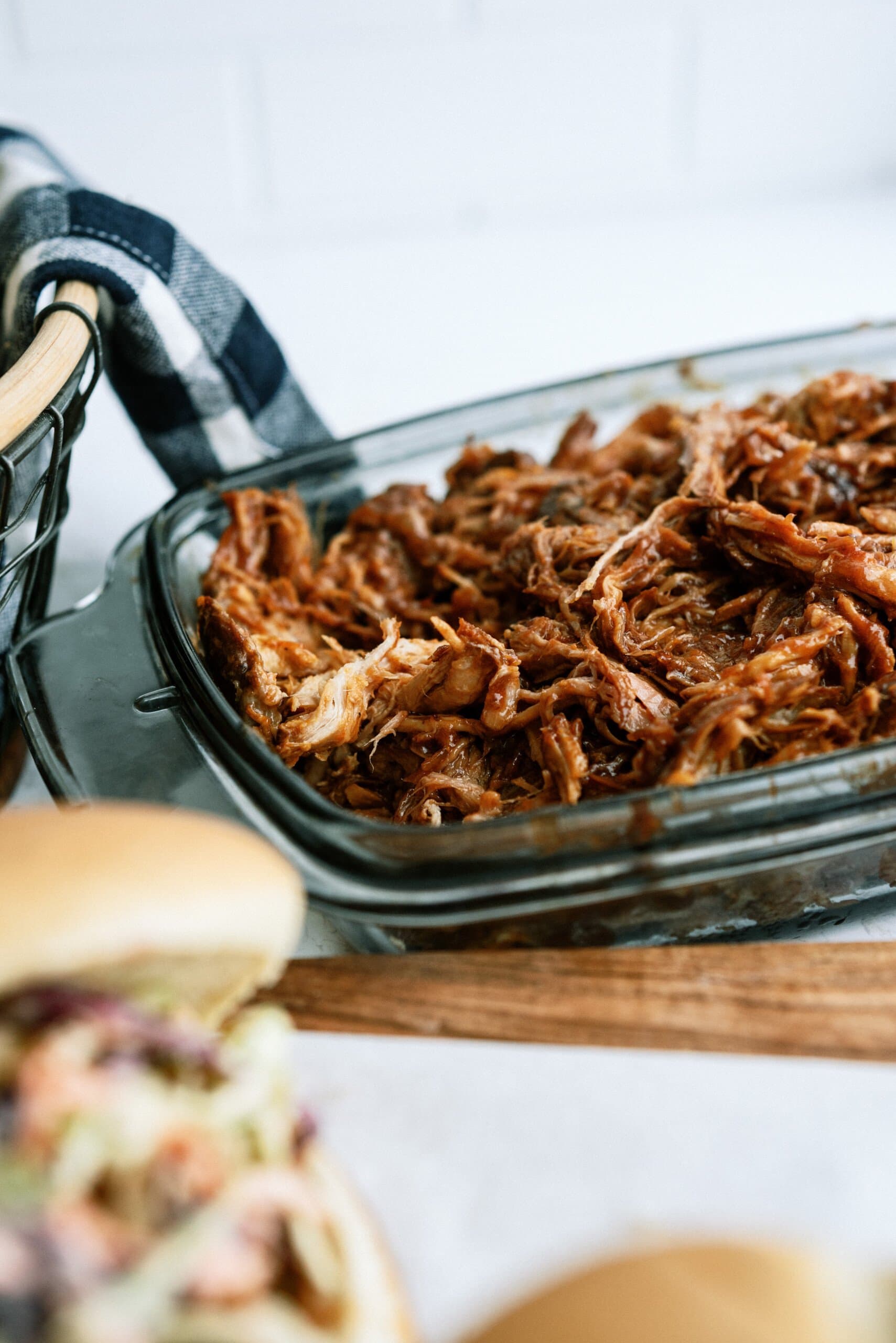 root beer pulled pork in a glass baking dish