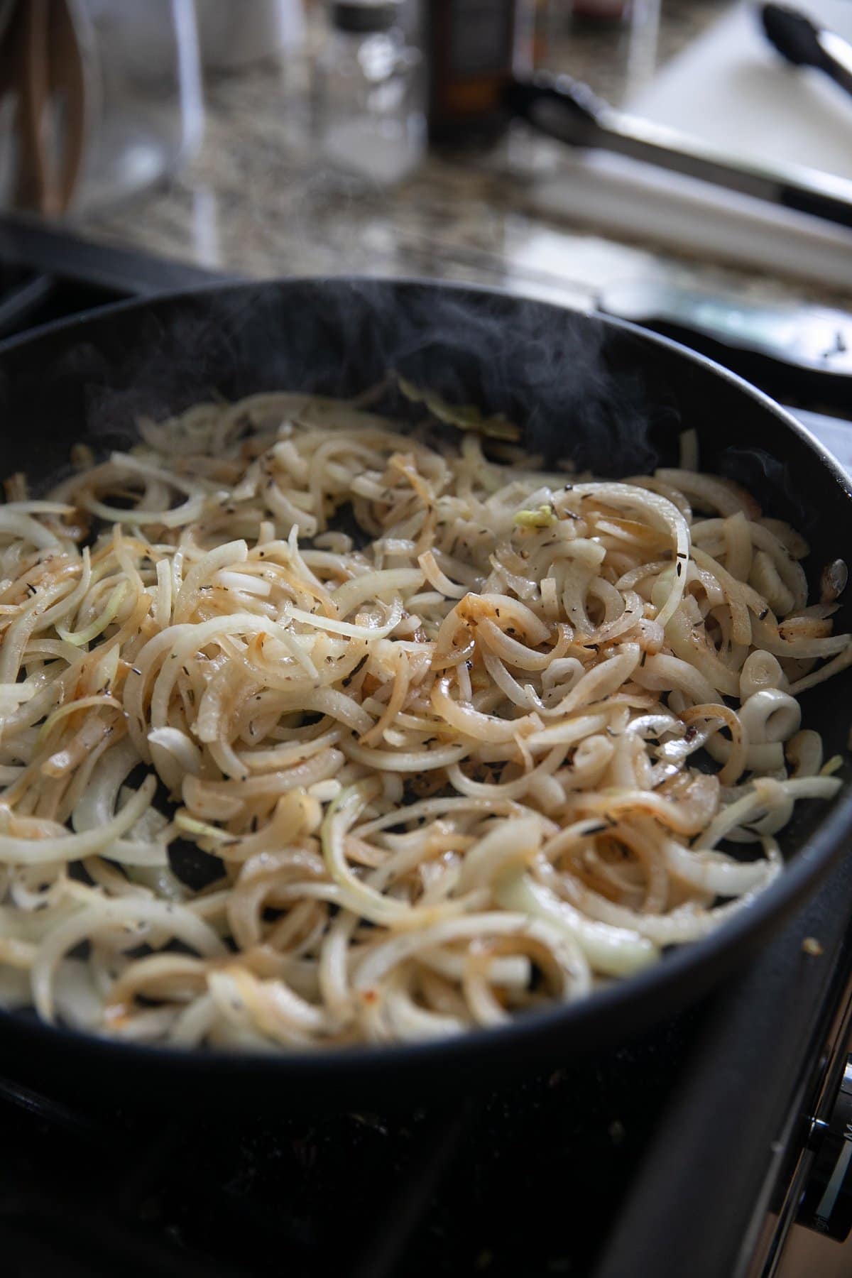 cooked down onions in a pan