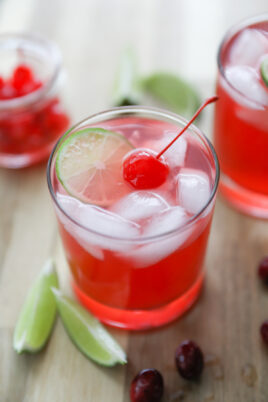 mocktail in glass with ice and cherry