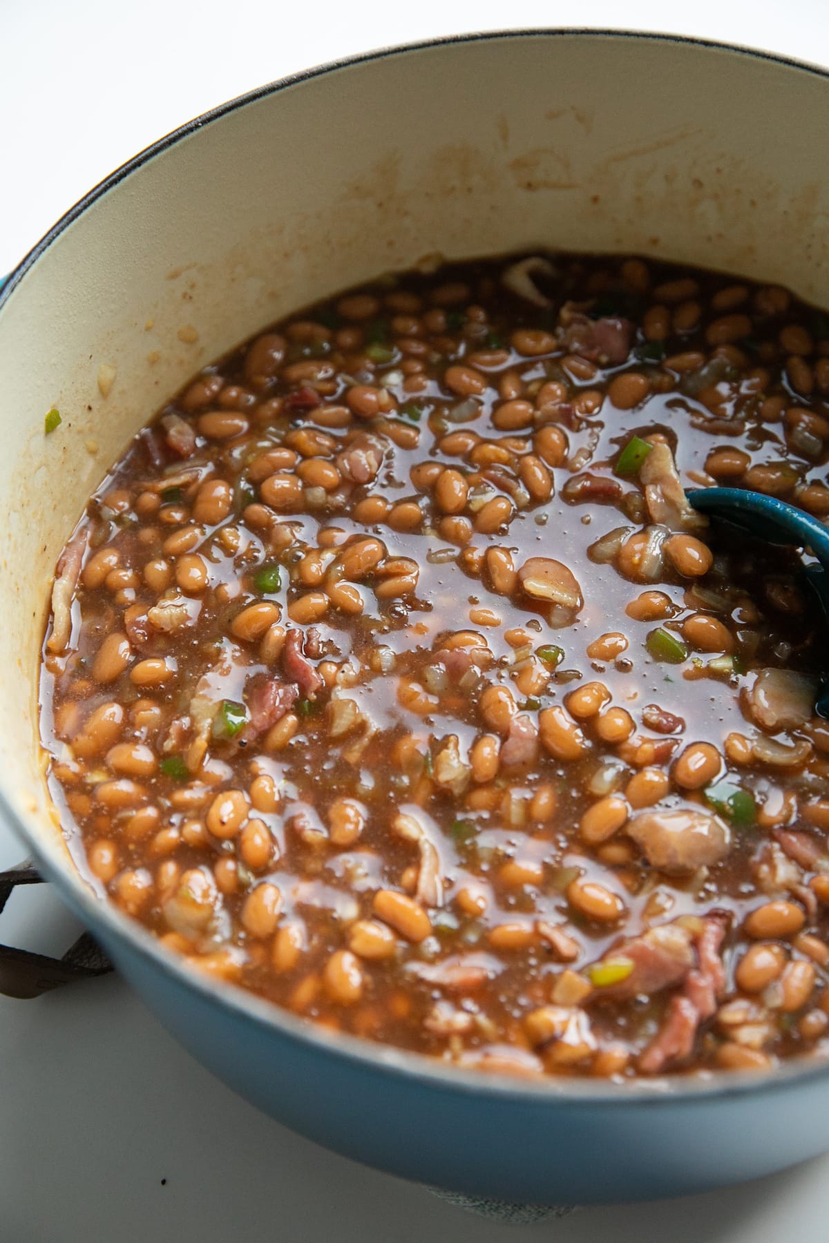 baked beans in pot before baking