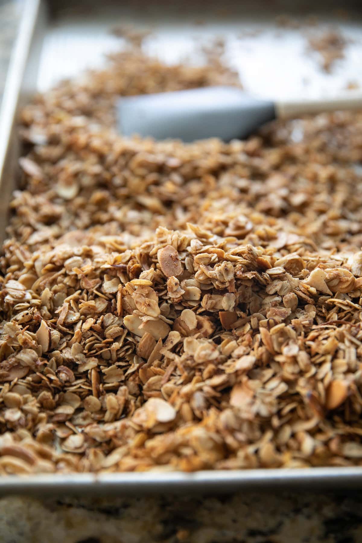 finished granola in a baking sheet