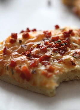 bite out of pancetta pizza
