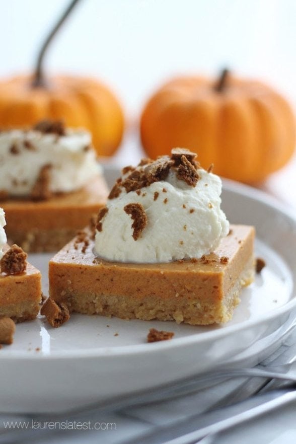 pumpkin pie bars cut into squares on plate