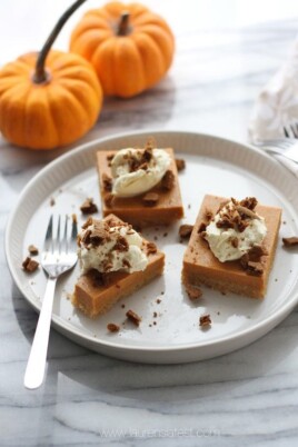 three pumpkin pie bars on white plate