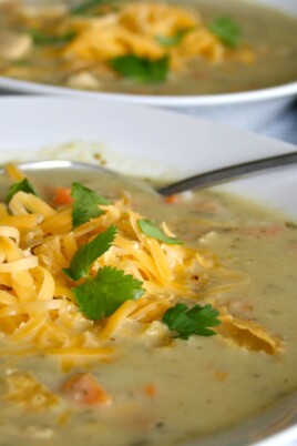 green chile soup in bowls