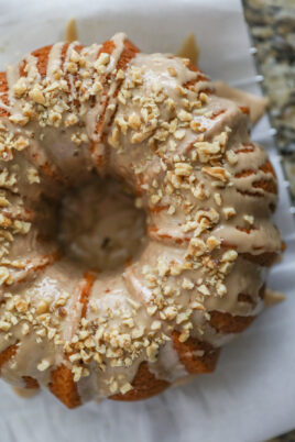 whole maple cake with icing and walnuts