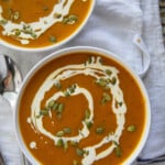 two bowls of pumpkin soup