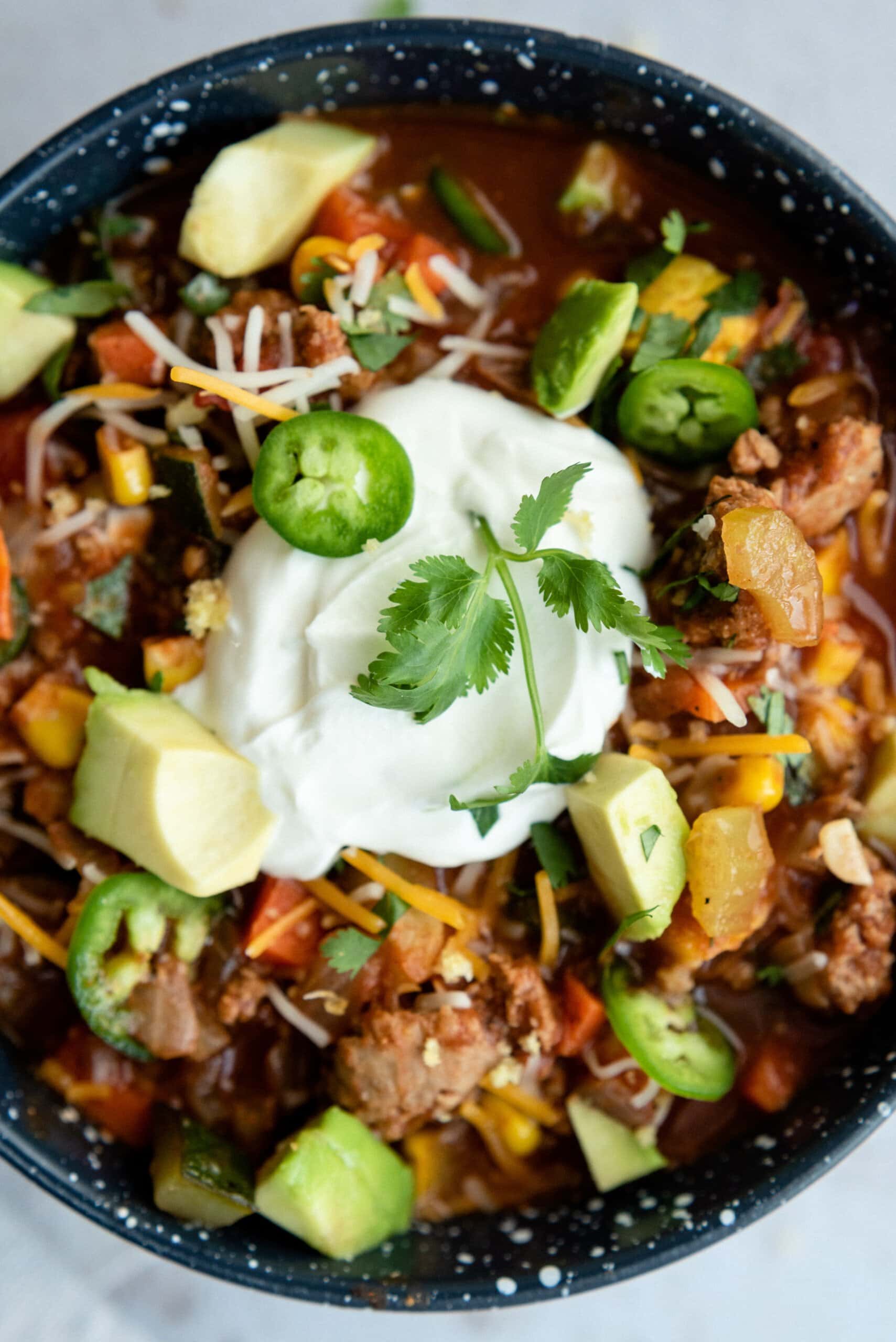 close up of chili with toppings