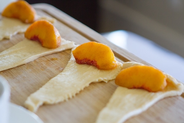 Peaches on crescent roll triangles