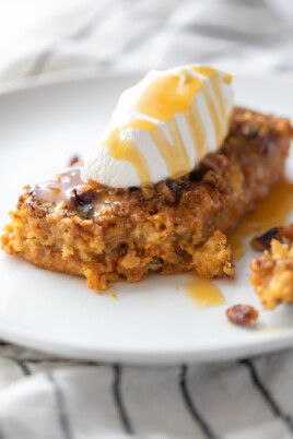 slice of pumpkin crunch cake with whipped cream