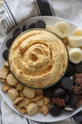 pumpkin dip with cookies and bananas around it