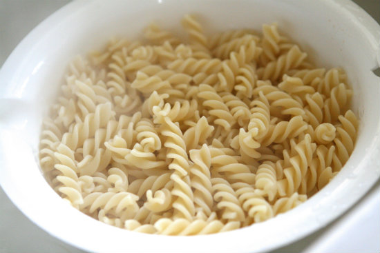 Cooked pasta in colander