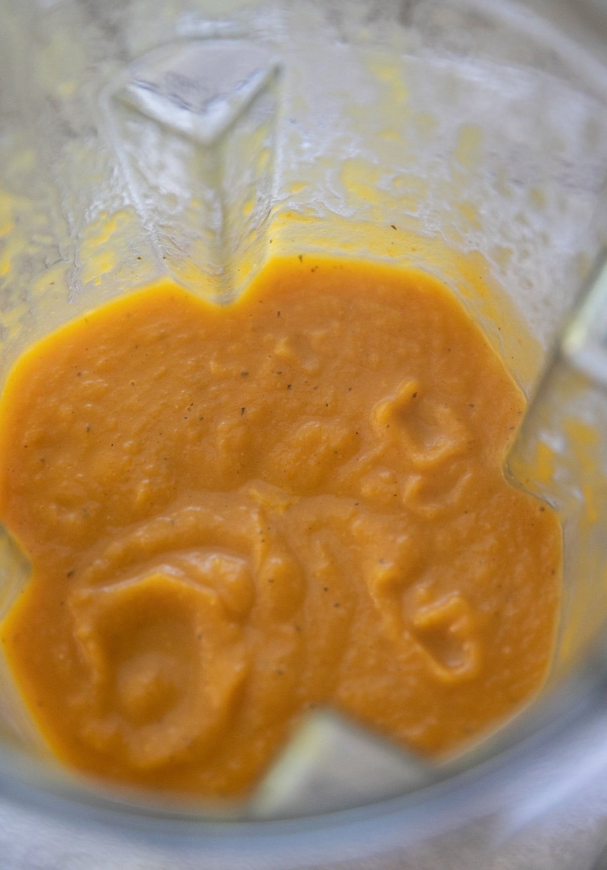 blended pumpkin soup in a blender