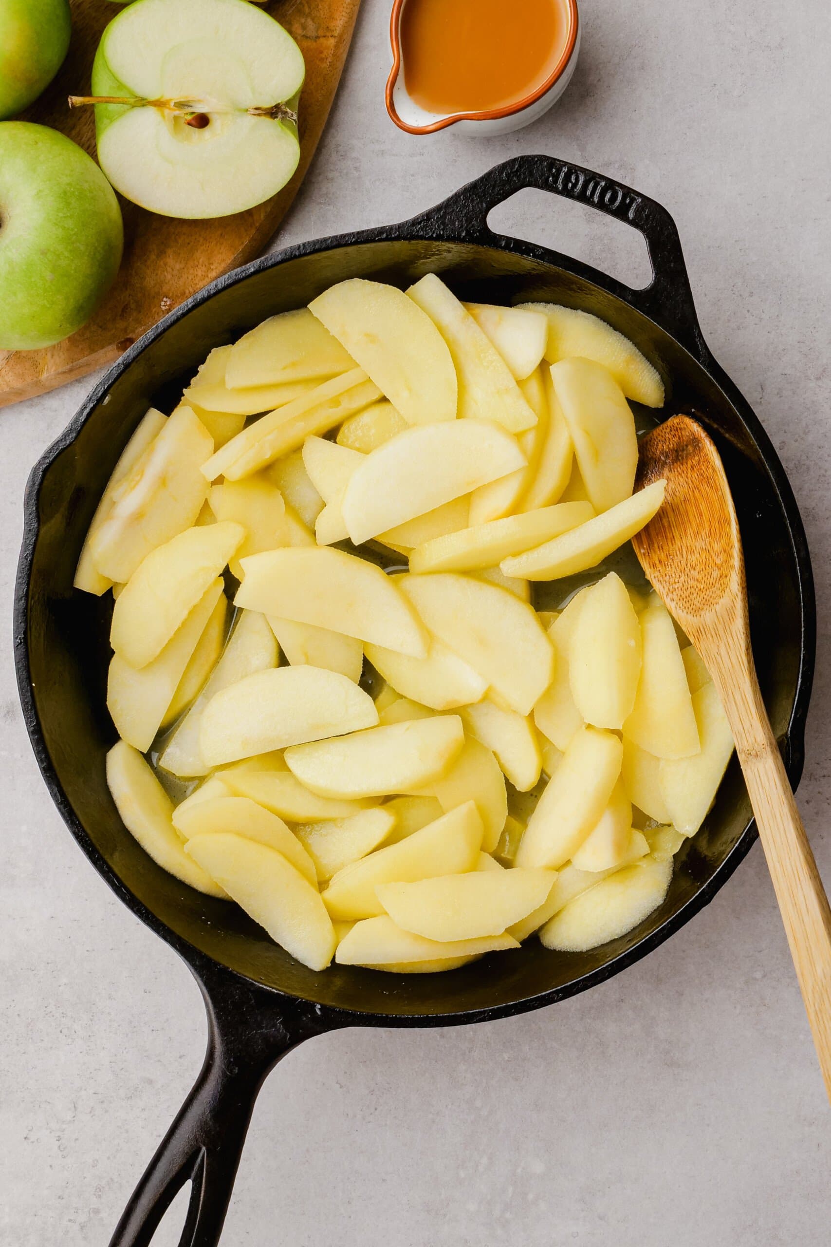 cooked apples in a cast iron skillet