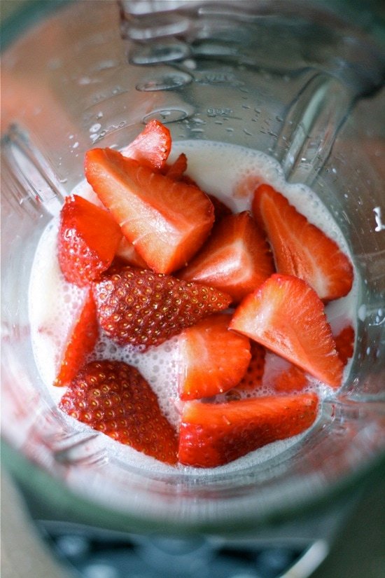 Strawberries and cream in a blender