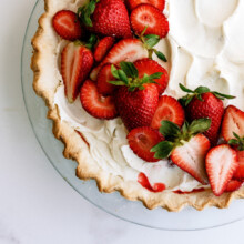 strawberry jello pie with whipped cream on top
