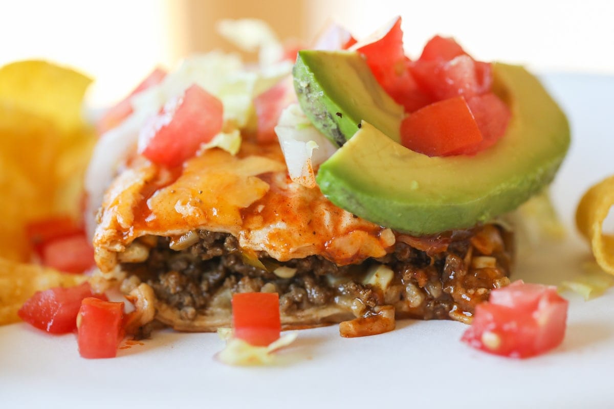 taco casserole piece with toppings