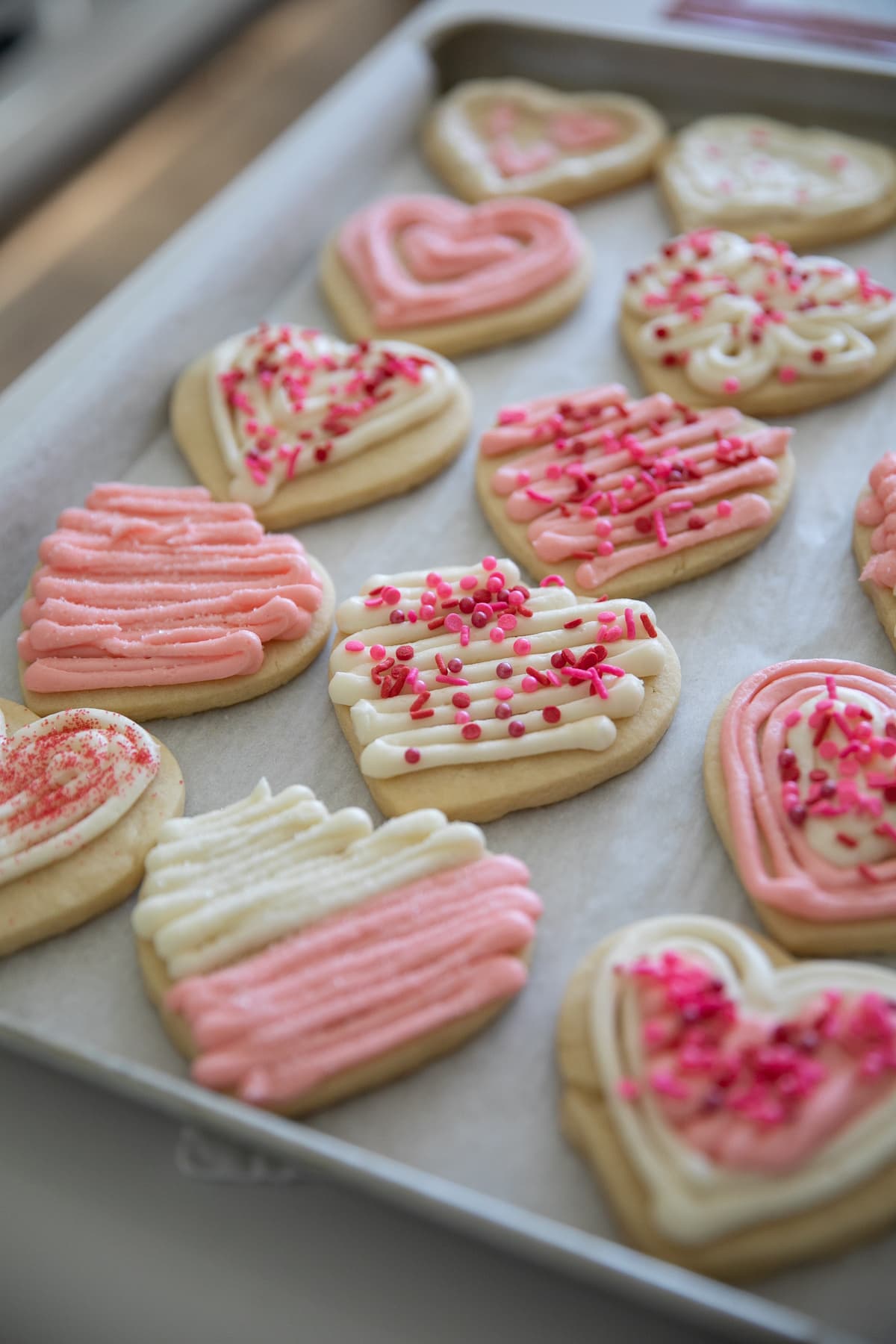 pan of frosted valentine sugar cookies