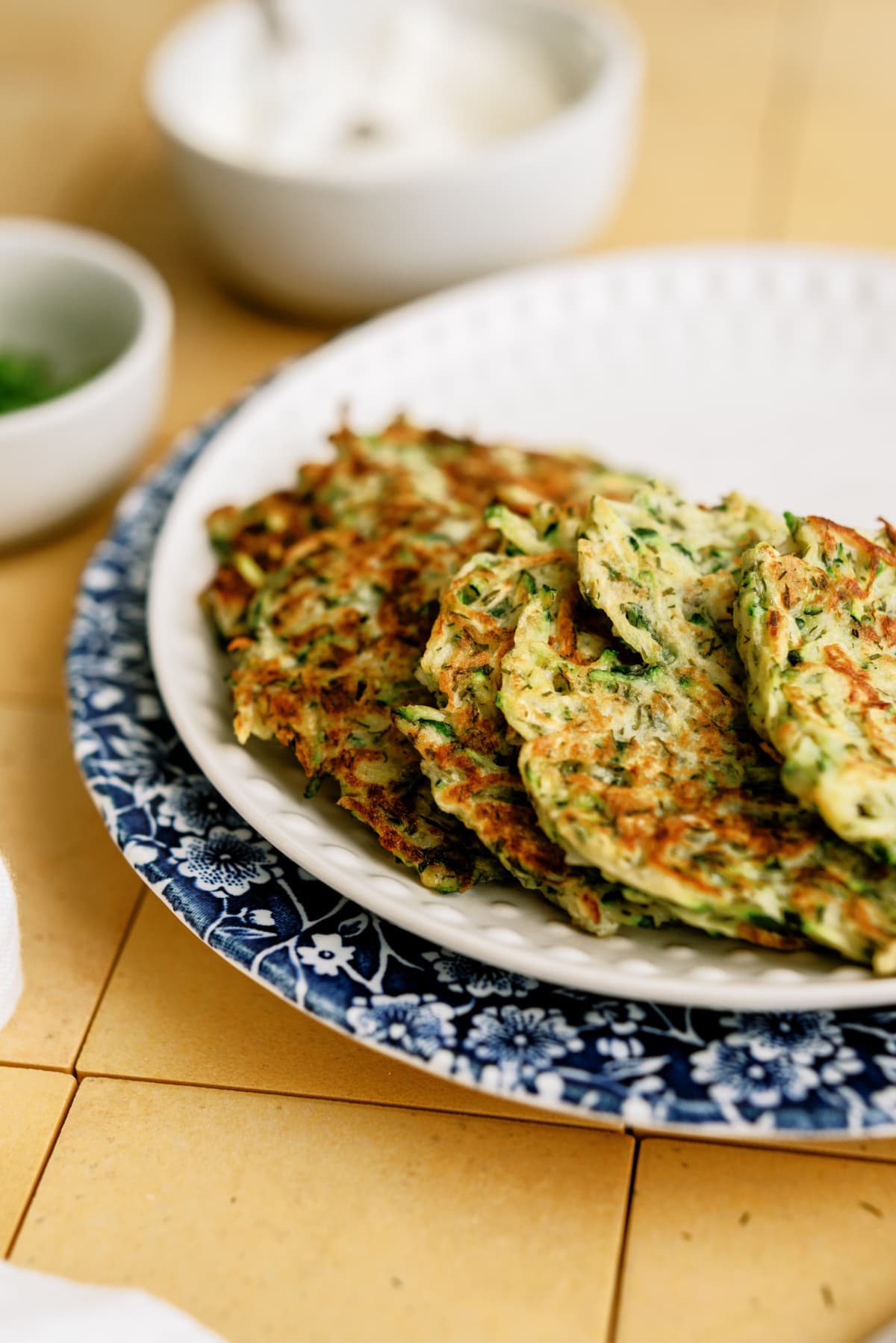 zucchini-fritters on plates